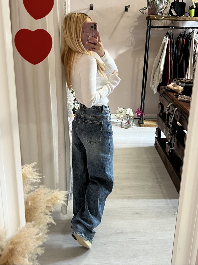 Jeans larghi chiusura incrociata asimmetrica