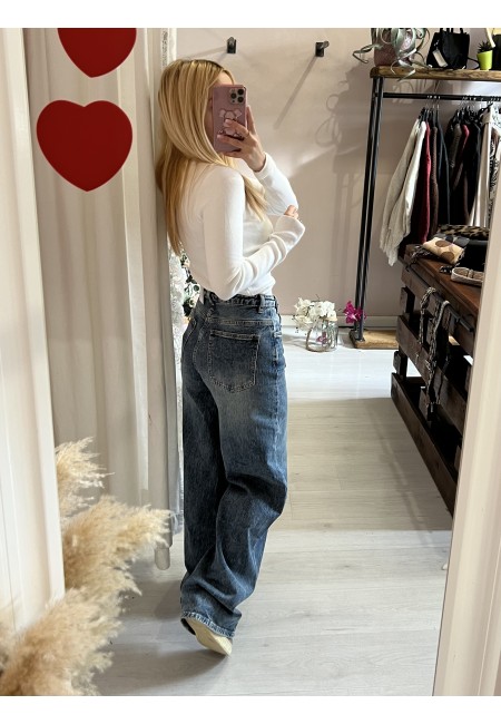 Jeans larghi chiusura incrociata asimmetrica