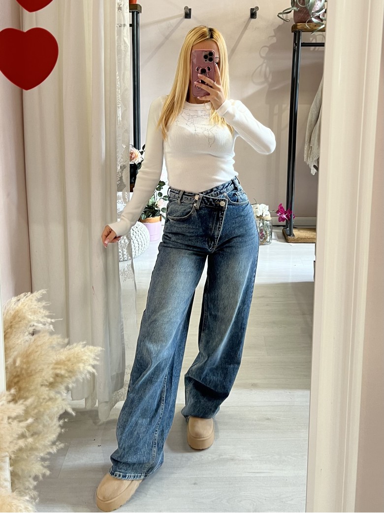 Jeans larghi chiusura incrociata asimmetrica