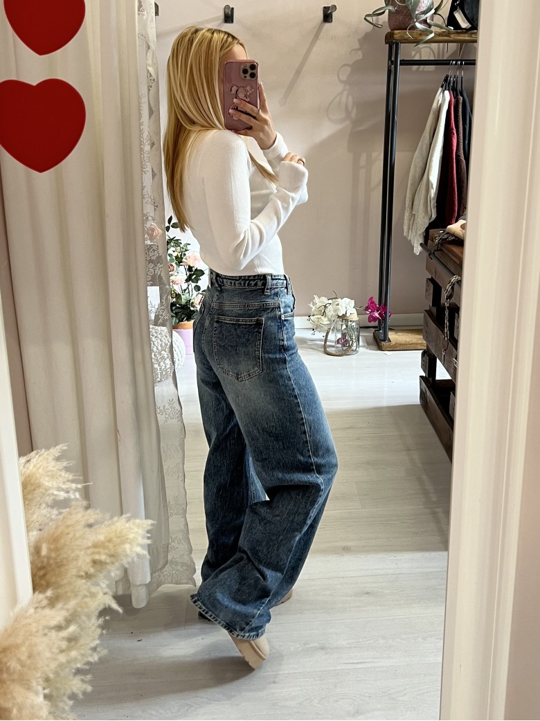 Jeans larghi chiusura incrociata asimmetrica