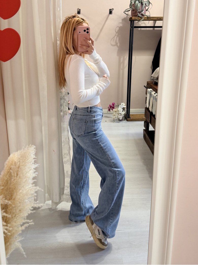 Jeans larghi chiusura asimmetrica