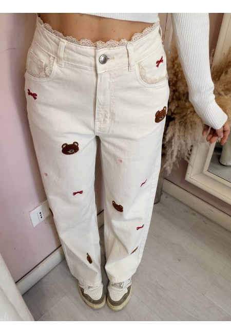 Jeans con pizzo e orsetti color burro