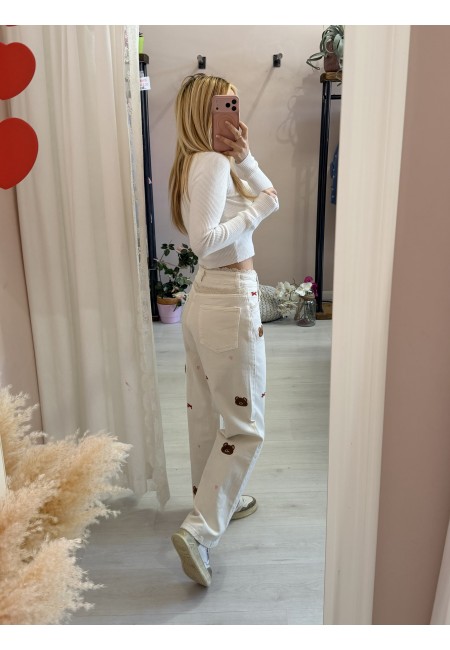 Jeans con pizzo e orsetti color burro