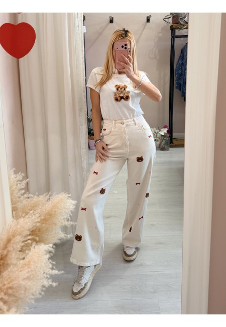 Jeans con pizzo e orsetti color burro