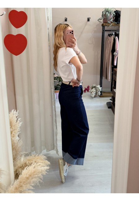 Pantaloni TIPO jeans larghi con balza