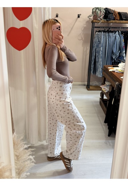 Pantaloni jeans bianchi roselline