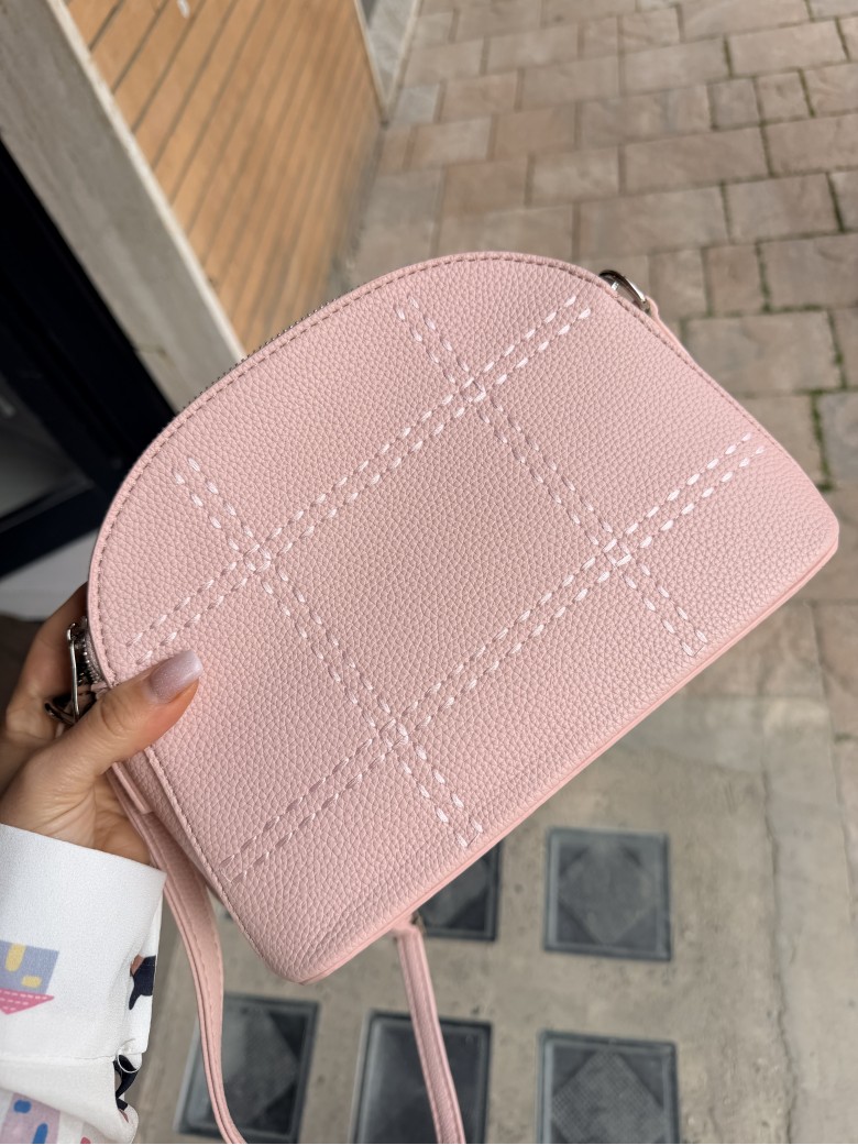 Borsetta rosa finiture con tracolla