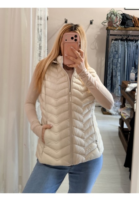 Piumino smanicato beige