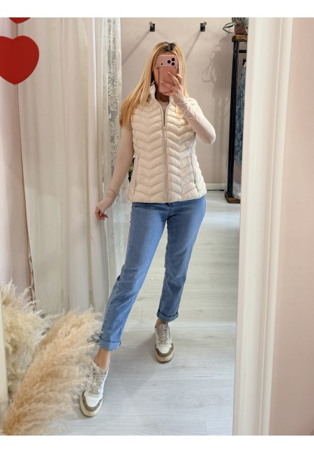 Piumino smanicato beige
