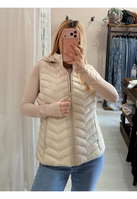 Piumino smanicato beige