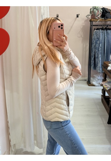 Piumino smanicato beige