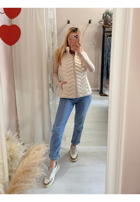 Piumino smanicato beige
