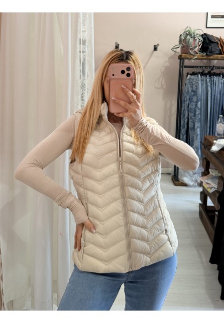 Piumino smanicato beige