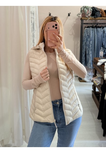 Piumino smanicato beige