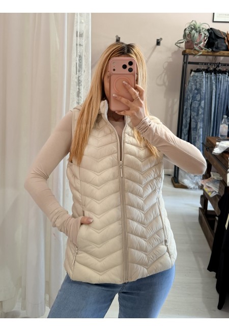 Piumino smanicato beige