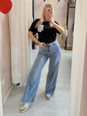 Pantaloni jeans larghi sfrangiati