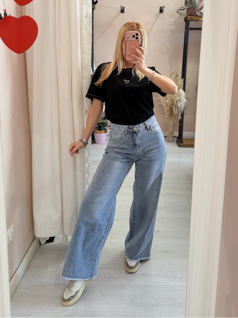 Pantaloni jeans larghi sfrangiati