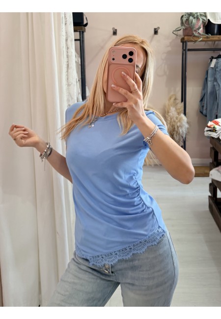Maglia slim asimmetrica con pizzo azzurra