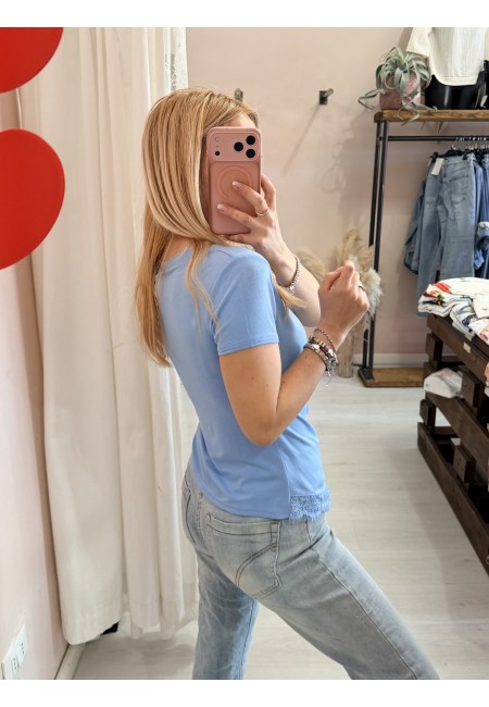 Maglia slim asimmetrica con pizzo azzurra