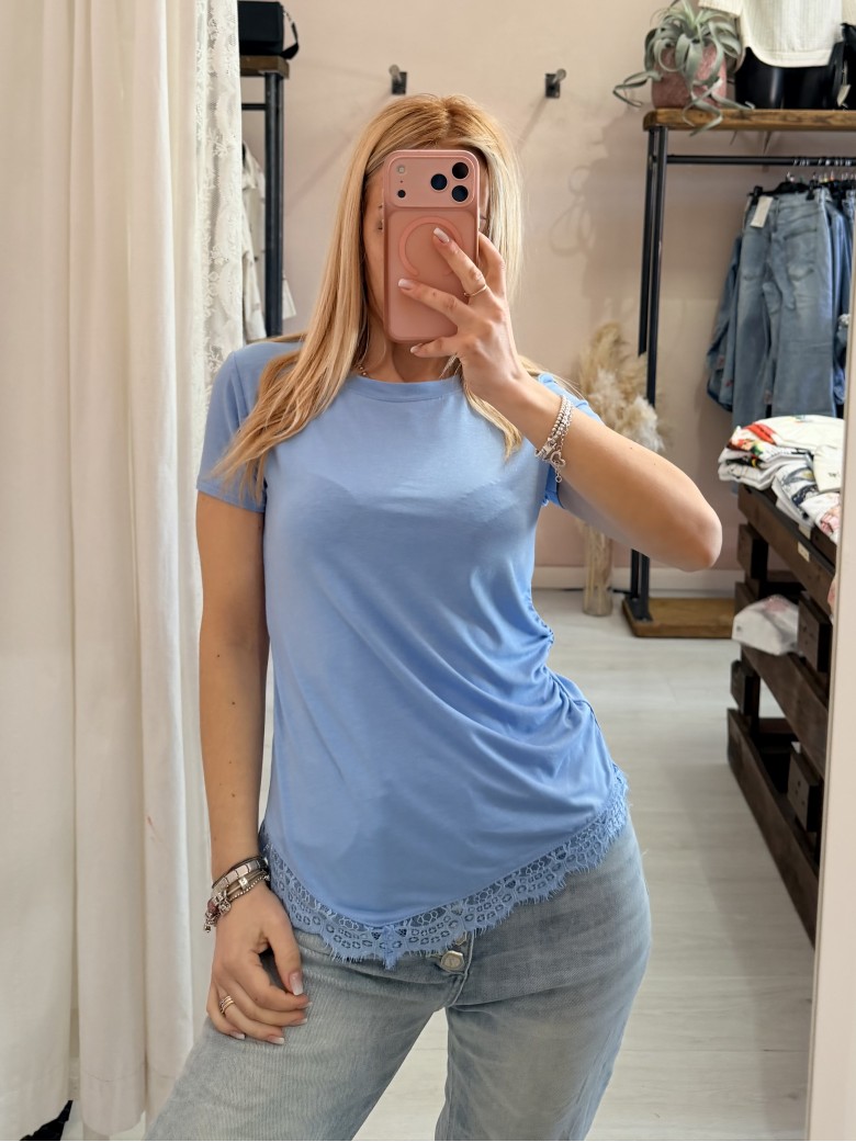 Maglia slim asimmetrica con pizzo azzurra