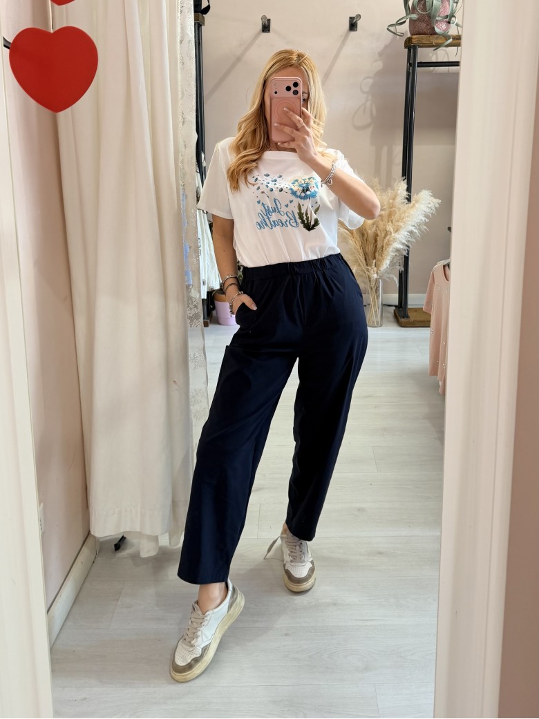 Maglia t shirt bianca soffioni blu